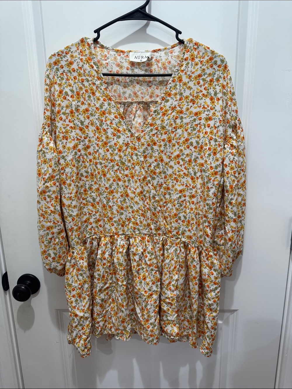 Aura women’s Cream Floral Peplum shirt with Orange Accents